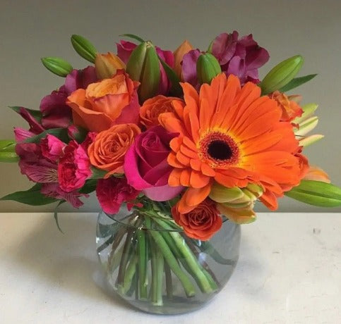 Pedido Especial: 11 Centros de Mesa en Pecera : 1 Gerbera Naranja, Rosa Clarita, Rosa Anaranjada, Astromelia,Lilis Rosas y Clavel Rosado