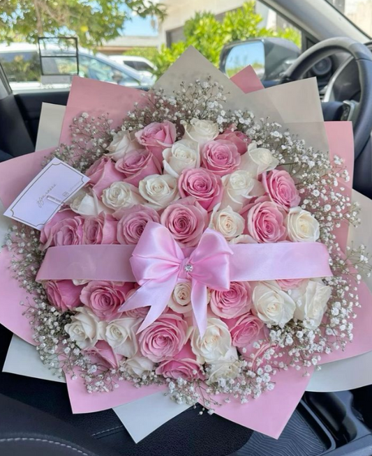 Special order Buchon bouquet 50 roses, 25 white and 25 pink.
