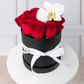 Señorita - Caja de Rosas Rojas con Orquídea DGO