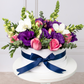 Verona - Caja de Rosas Claritas y Rojas con Lisianthus y Orquídea DGO