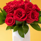 12 Rosas Rojas con Florero Rostro - Flores